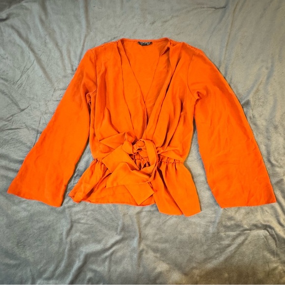 Topshop Orange Wrap Blouse with Tie Front and V-Neckline
#1088 - Picture 2 of 8
